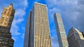 Buildings, modern and old architecture and blue sky in manhattan in new york Royalty Free Stock Photo