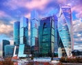 Buildings in Moscow city with light reflections in river