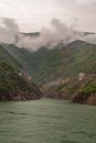 Buildings on mountains edge along Xiling Gorge, Shengli Street, China