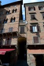 Buildings and narrow stairs in Siena city in Tuscany, Italy.