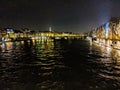 Buildings of Paris around Louvre complex with Seine river at night, France. Royalty Free Stock Photo