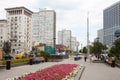 Buildings, people, flowerbed and benches 20.08.2018