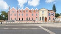 Buildings with Pink Wall and Triangular Roof