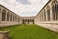 Buildings of Pisa, Italy. Medieval Crusade Cementer, Pisa Italy. View of Pisa from Cementery. Pisa - Camposanto interior