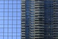 Buildings are reflected in the skyscrapers of the city of Calgary.