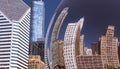 Buildings reflection in a Chicago Cloud Gate Bean