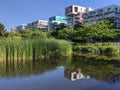 Buildings reflection in a water fountain in Boulogne Billancourt