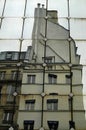 Buildings reflections on mirror facade