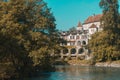 Buildings by river near Saint-Jean-Pied-de-Port, France Royalty Free Stock Photo