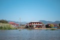 Buildings by the riverside at Inle Lake, Myanmar Royalty Free Stock Photo