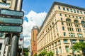 Buildings and signs is a town square and public space in the Quartier International de MontrÃÂ©al Royalty Free Stock Photo