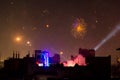 Buildings silhouetted against fireworks in Jaipur