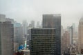 Buildings, Skyscrapers and Towers in Manhattan on a Foggy Day of Winter. Aerial View of New York City Royalty Free Stock Photo