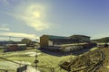 Buildings surrounded by trees under the sunlight and a blue sky in the Riotinto Mines in Spain