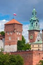 Old houses and towers behind the fortress wall on the banks of the river.