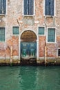 Buildings with traditional Venetian windows in Venice, Italy Royalty Free Stock Photo