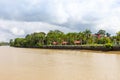 buildings and trees along Sungai Temburong river in the Temburong District in Brunei Darussalam Royalty Free Stock Photo