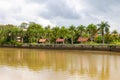 buildings and trees along Sungai Temburong river in the Temburong District in Brunei Darussalam Royalty Free Stock Photo