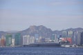 Buildings under construction in the newly developed area of ??Kowloon City against the background of the Lion Rock