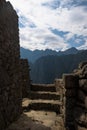 Buildings, walls and terraces of the mystic Inca city Machu Picchu in the Andes