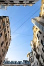 Buildings well closed to each other,the sky crossed with wires in Saint Petersburg