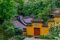 Buildings with yellow wall, red door, and black roof tiles, Lingyin Temple, Hangzhou, China Royalty Free Stock Photo