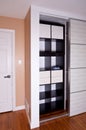 Built-in closet with sliding door shelving storage organization