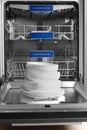 Open dishwasher in the kitchen Royalty Free Stock Photo