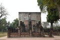 Exterior of Wat Si Chum & its massive assembly hall in the middle of the complex from which its Giant Buddha is visible, Sukhothai