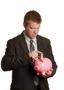 Buisinessman saving piggy bank Royalty Free Stock Photo