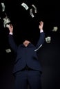 Buisnessman and falling down money Royalty Free Stock Photo