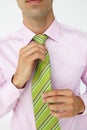 Buisnessman straightening tie Royalty Free Stock Photo