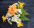 Bouquet of roses, chamomiles and daylilies. Royalty Free Stock Photo