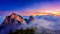Bukhansan mountains is covered by morning fog and sunrise. Royalty Free Stock Photo
