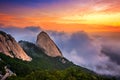 Bukhansan mountains is covered by morning fog and sunrise. Royalty Free Stock Photo