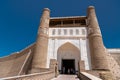 View to the Tourists near the Entrance Gates of the Ark, Bukhara, Uzbekistan Royalty Free Stock Photo