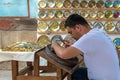 Master of artistic coinage works, Bukhara. Uzbekistan Royalty Free Stock Photo