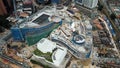 View from above, top down aerial view of a construction site with cranes in Kuala Lumpur, Malaysia