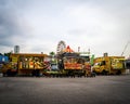 Food trucks selling various selections at the Euro Fun Park fun fair at night