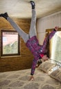 BUKOVEL, IVANO FRANKIVSKAYA OBLAST, UKRAINE- April 2, 2018: Acrobatic trick above the bed