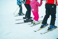 BUKOVEL, UKRAINE - December 9, 2018: legs of skiing people close up