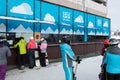 BUKOVEL, UKRAINE - FEBRUARY 28, 2018 Skiers standing in the ticket line to the ticket office, Bukovel, Ukraine