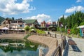 Bukovel. Ukraine. 17. July. 2021. Beautiful fish restaurant by the lake, in a ski resort. Carpathians. Summer rest Royalty Free Stock Photo