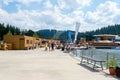 Bukovel. Ukraine. 17. July. 2021. Lake of Youth. A beautiful cafe and recreation area on the beach of a mountain lake. Carpathians Royalty Free Stock Photo