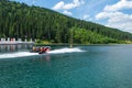 Bukovel. Ukraine. 17. July. 2021. Lake of Youth. Extreme water activities. Carpathians. Summer Vacation Royalty Free Stock Photo