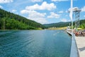 Bukovel. Ukraine. 17. July. 2021. Lake of Youth. Nice view of the mountain lake, with the beach. Carpathians. Summer Vacation Royalty Free Stock Photo