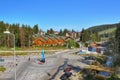 Wooden cottages in the ski resort, square and beautiful hill in Bukovel, Ukraine