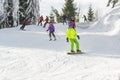 2016-12-17 Bukovel, Ukraine. Skiers and snowboarders on the slopes of Bukivel Ski resort