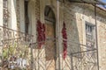 Architecture detail - Old house balcony with papers drying, Bukovo village, Macedonia Royalty Free Stock Photo