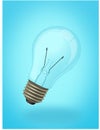 Bulb on blue background Royalty Free Stock Photo